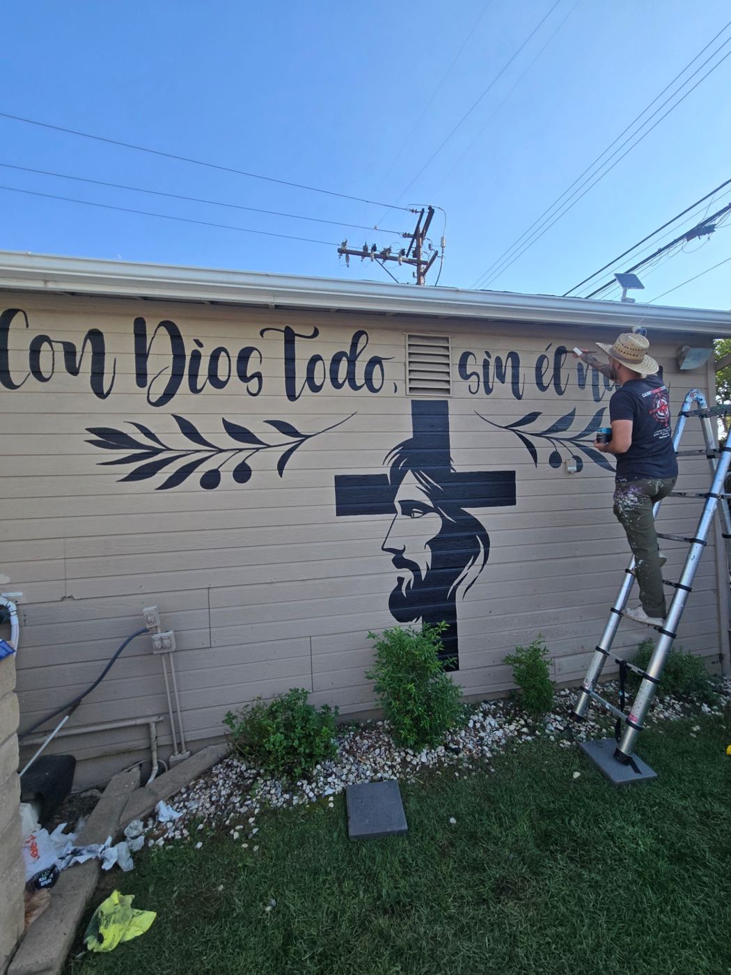 Con Dios Todo hand-lettered cross mural in progress