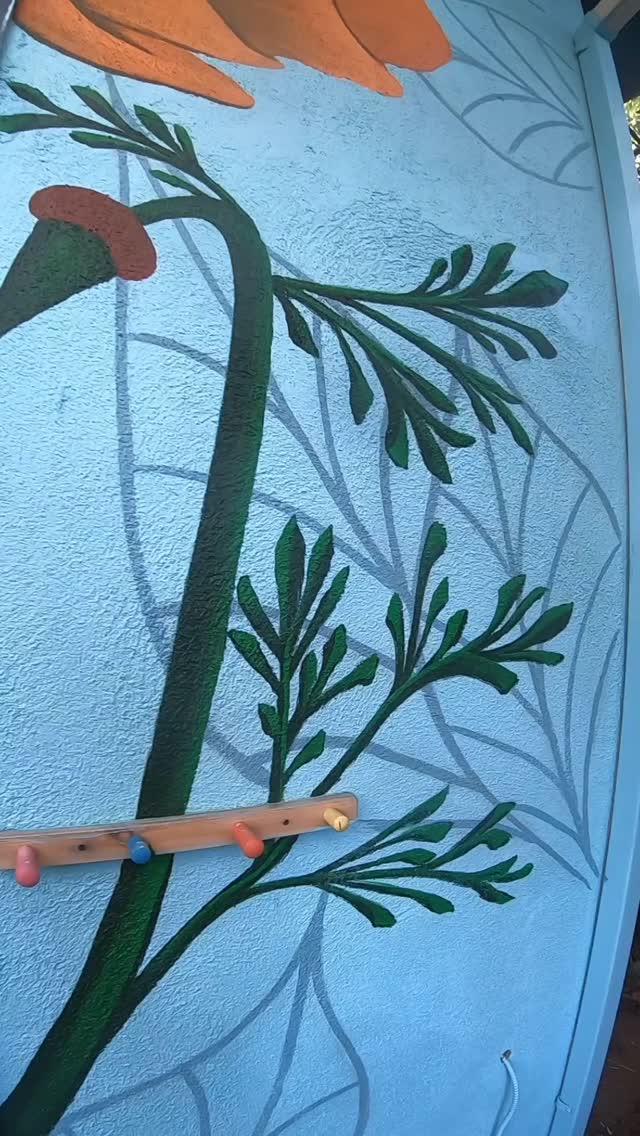 Botanical mural with orange poppies